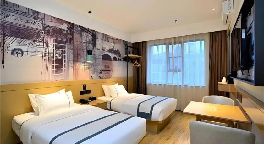 Bed in City Comfort Inn Kunming Xi'an Kang Road