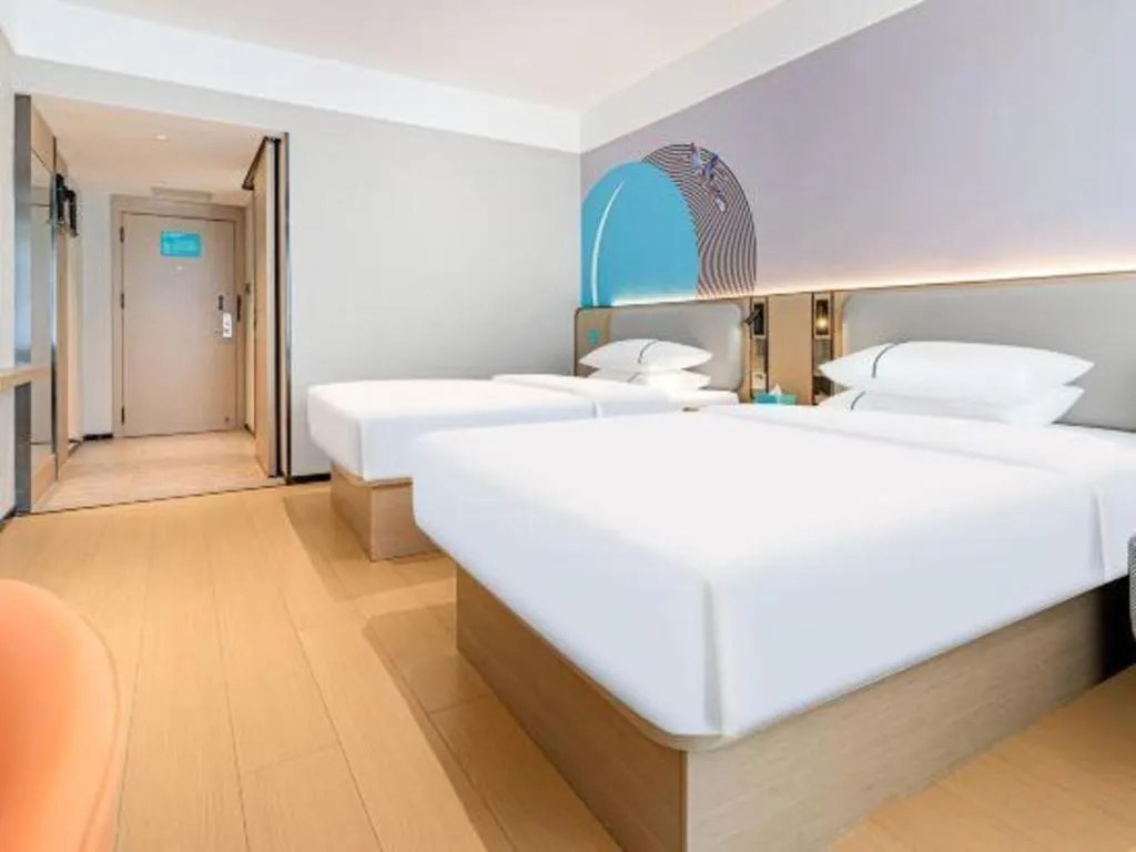 Bed in City Comfort Inn Kunming Xi'an Kang Road