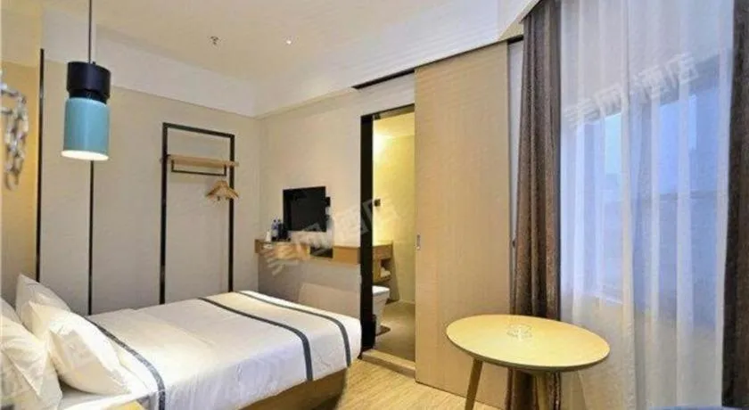 Bed in City Comfort Inn Kunming Xi'an Kang Road