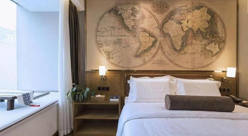 Bed in James Joyce Coffetel Zhengzhou Beilong Wetland Park