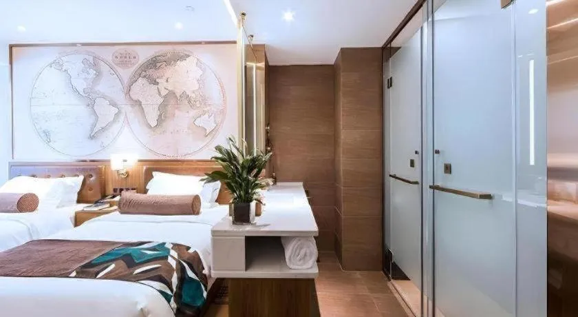 Bed in James Joyce Coffetel Zhengzhou Beilong Wetland Park