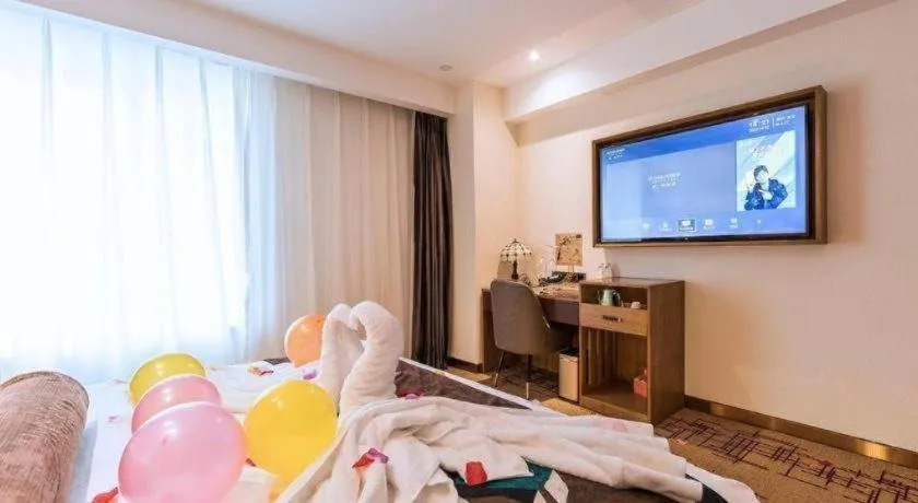 Bed in James Joyce Coffetel Zhengzhou Beilong Wetland Park