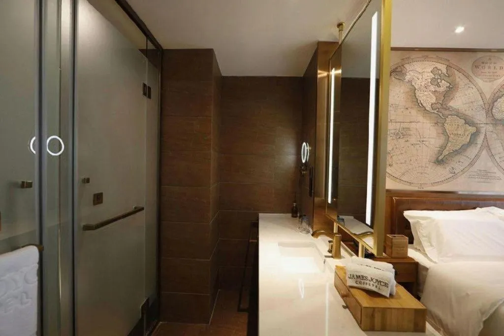 Bed in James Joyce Coffetel Zhengzhou Beilong Wetland Park