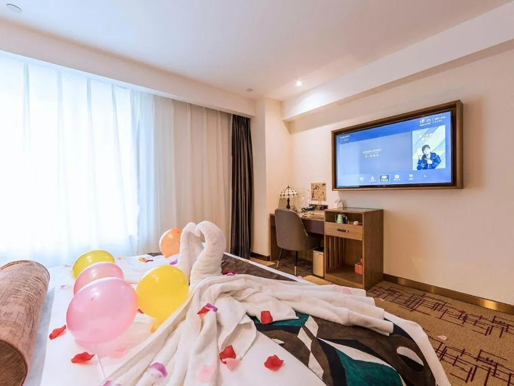 Bed in James Joyce Coffetel Zhengzhou Beilong Wetland Park