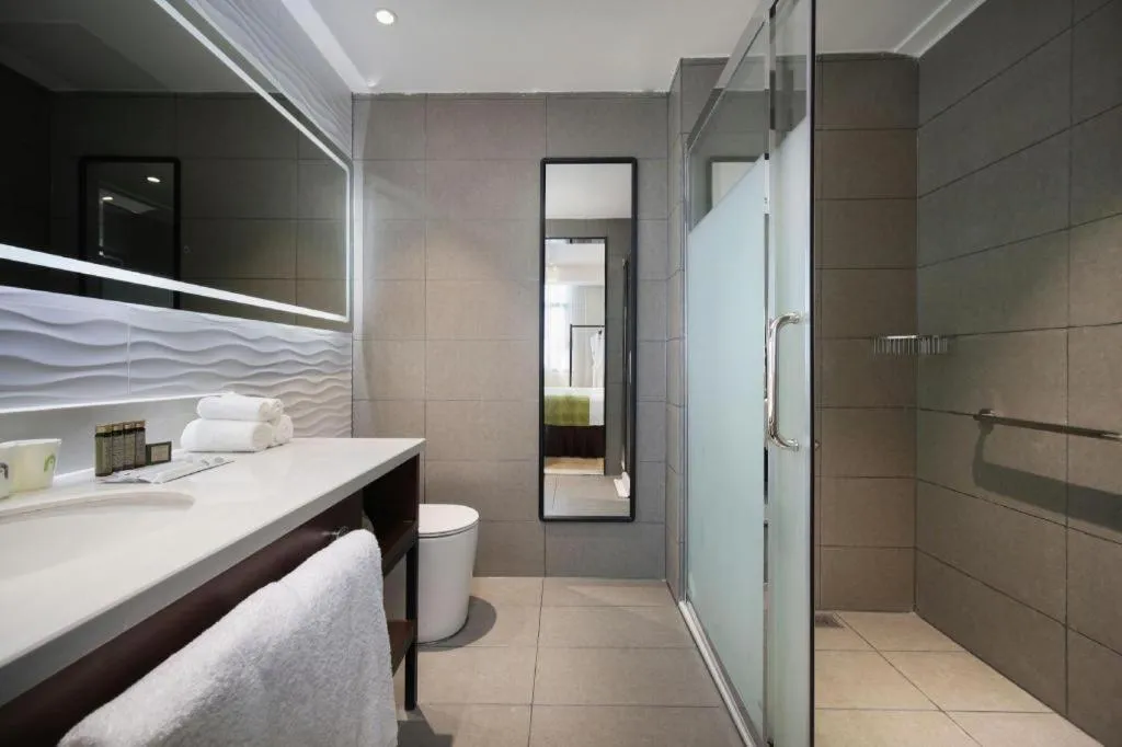 Bed in Campanile Hotel Shenzhen Bay Convention and Exhibition Center