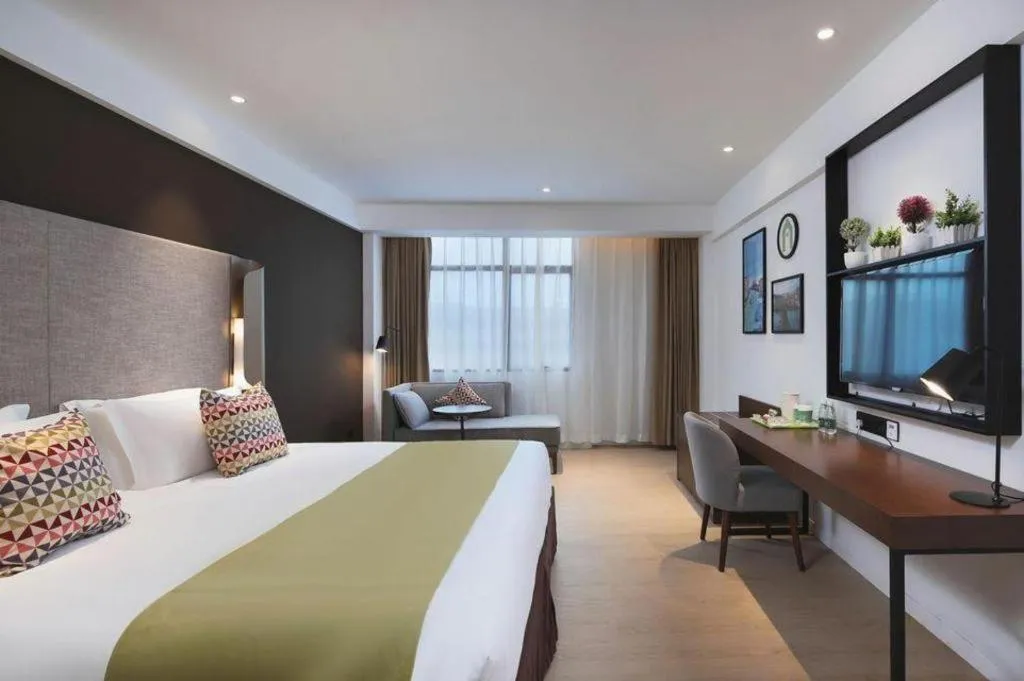 Bed in Campanile Hotel Shenzhen Bay Convention and Exhibition Center