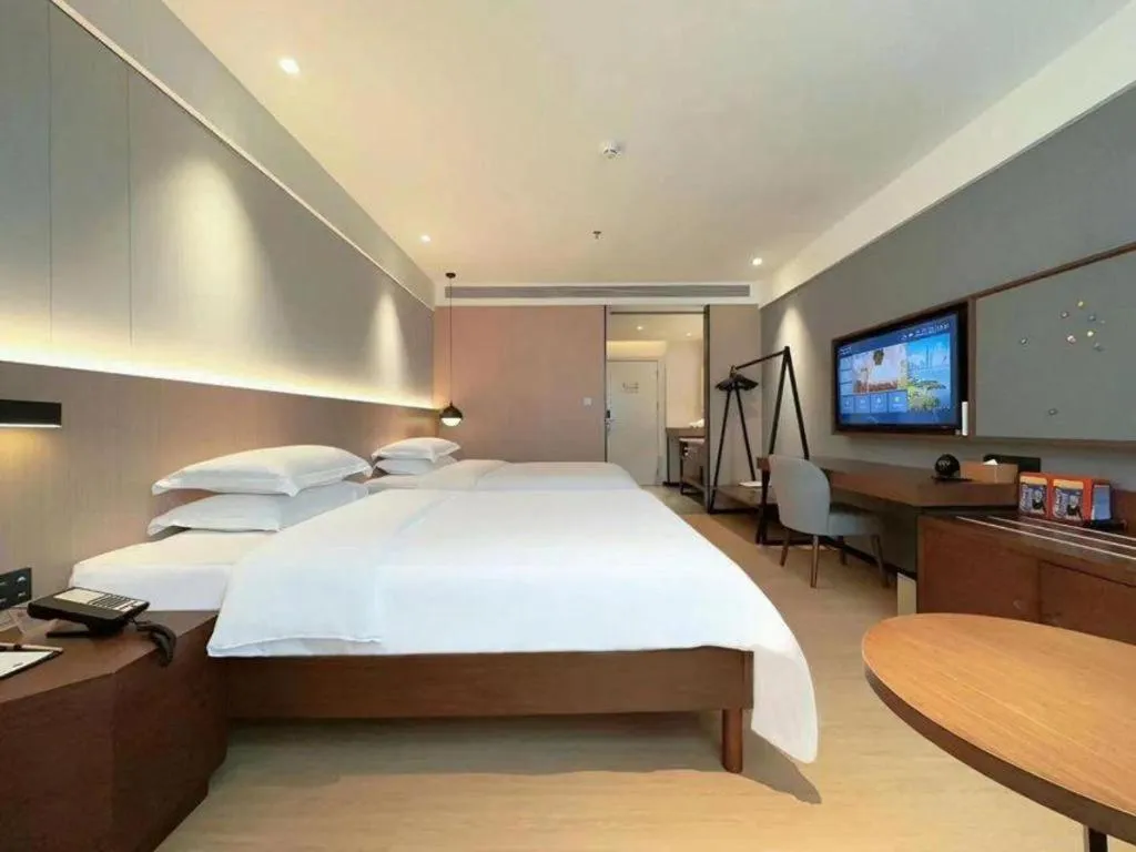 Bed in Campanile Hotel Shenzhen Bay Convention and Exhibition Center