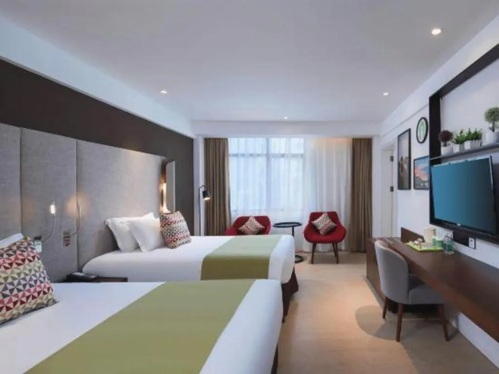 Bed in Campanile Hotel Shenzhen Bay Convention and Exhibition Center