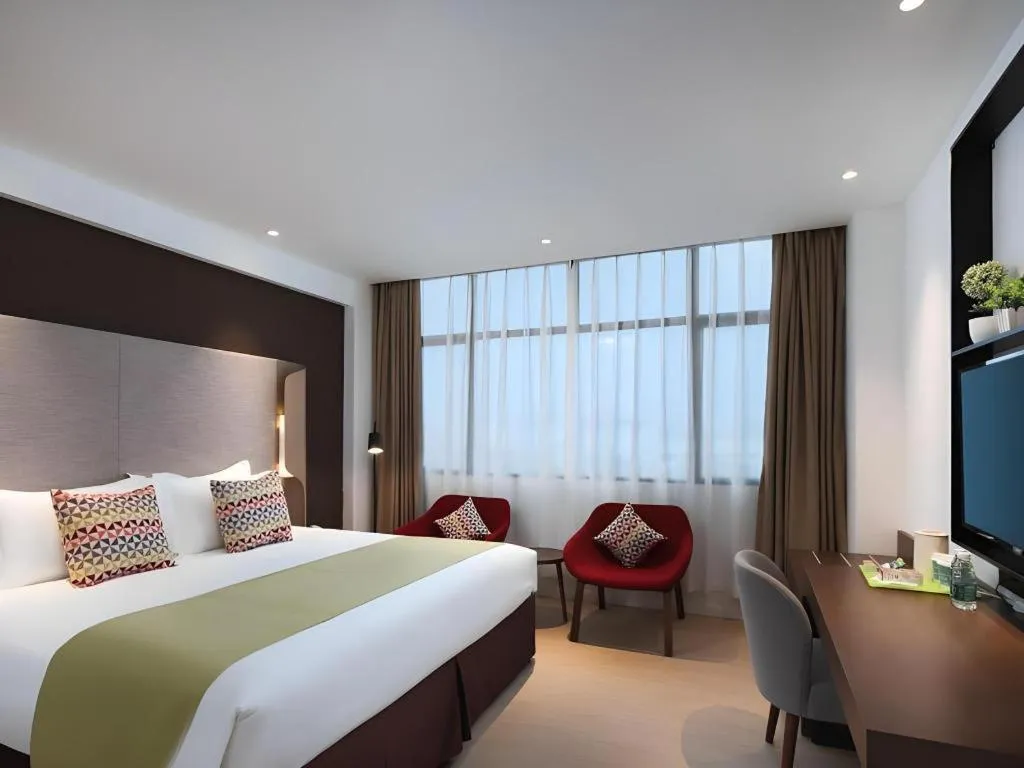 Bed in Campanile Hotel Shenzhen Bay Convention and Exhibition Center