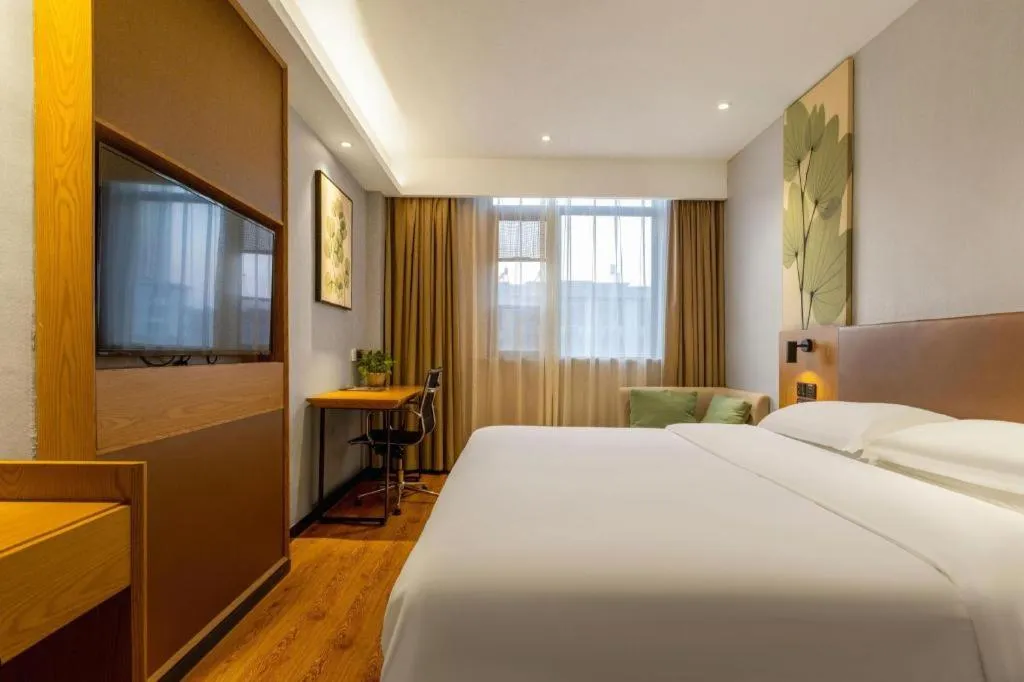 Bed in GreenTree Inn Express Fuzhou Le'an County Government Sijiu Square