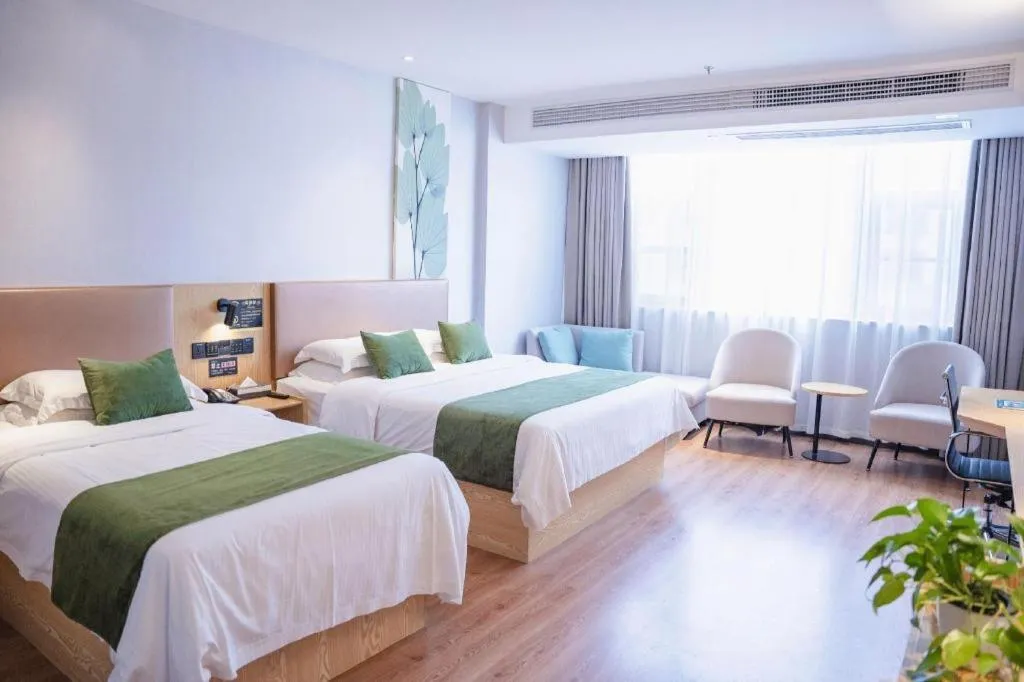 Bed in GreenTree Inn Express Fuzhou Le'an County Government Sijiu Square