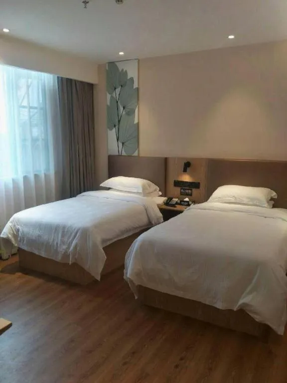 Bed in GreenTree Inn Express Fuzhou Le'an County Government Sijiu Square