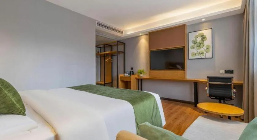 Bed in GreenTree Inn Express Fuzhou Le'an County Government Sijiu Square