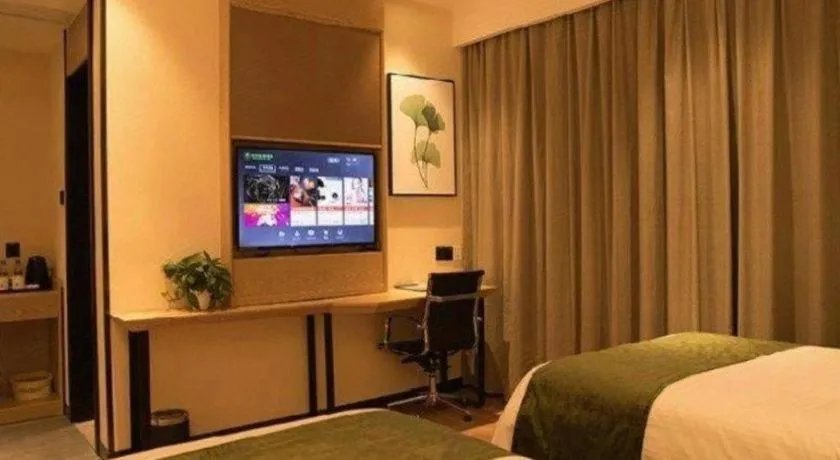 Bed in GreenTree Inn Express Fuzhou Le'an County Government Sijiu Square