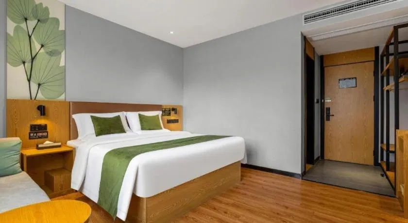 Bed in GreenTree Inn Express Fuzhou Le'an County Government Sijiu Square