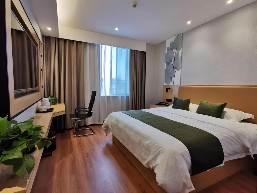 Bed in GreenTree Inn Express Fuzhou Le'an County Government Sijiu Square