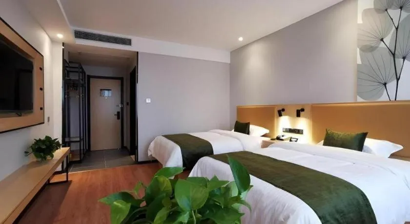 Bed in GreenTree Inn Express Fuzhou Le'an County Government Sijiu Square