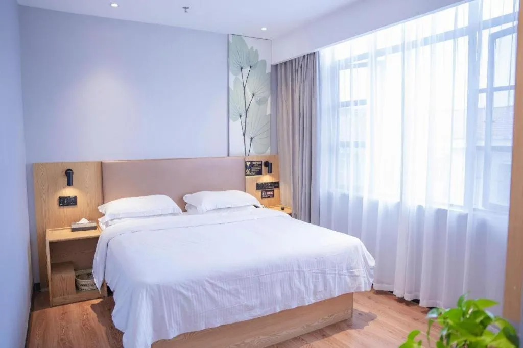 Bed in GreenTree Inn Express Fuzhou Le'an County Government Sijiu Square