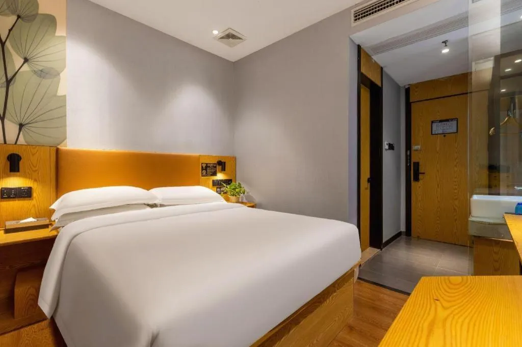 Bed in GreenTree Inn Express Fuzhou Le'an County Government Sijiu Square