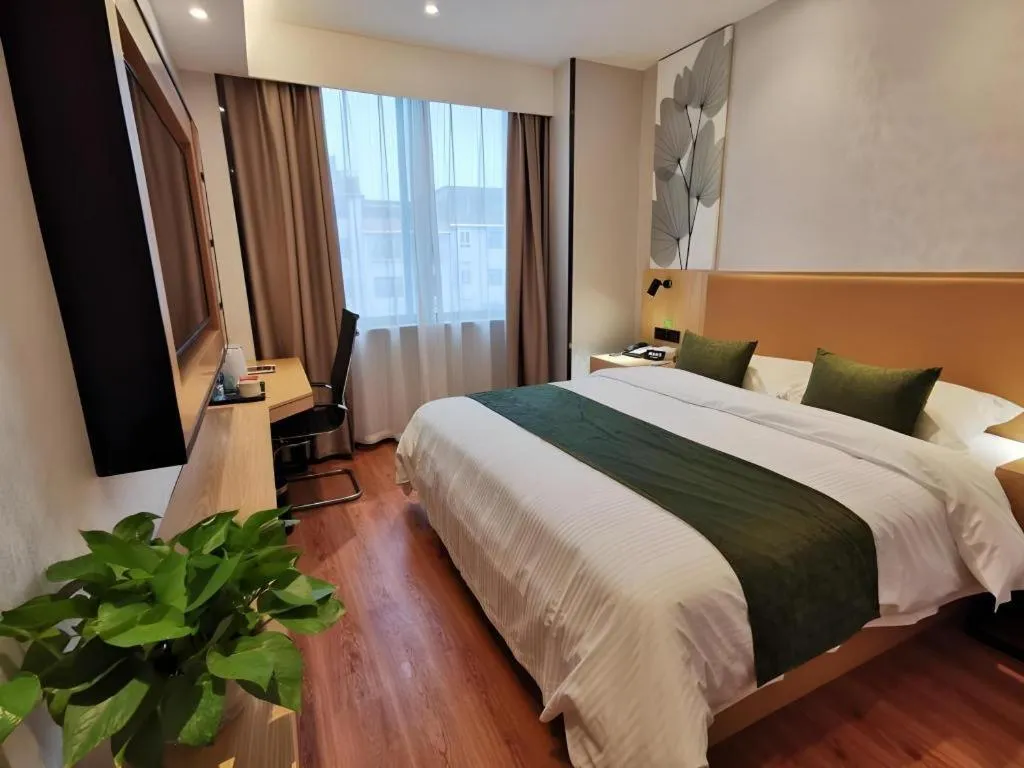 Bed in GreenTree Inn Express Fuzhou Le'an County Government Sijiu Square