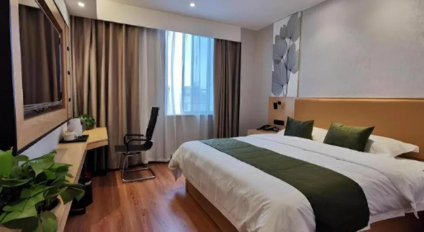 Bed in GreenTree Inn Express Fuzhou Le'an County Government Sijiu Square