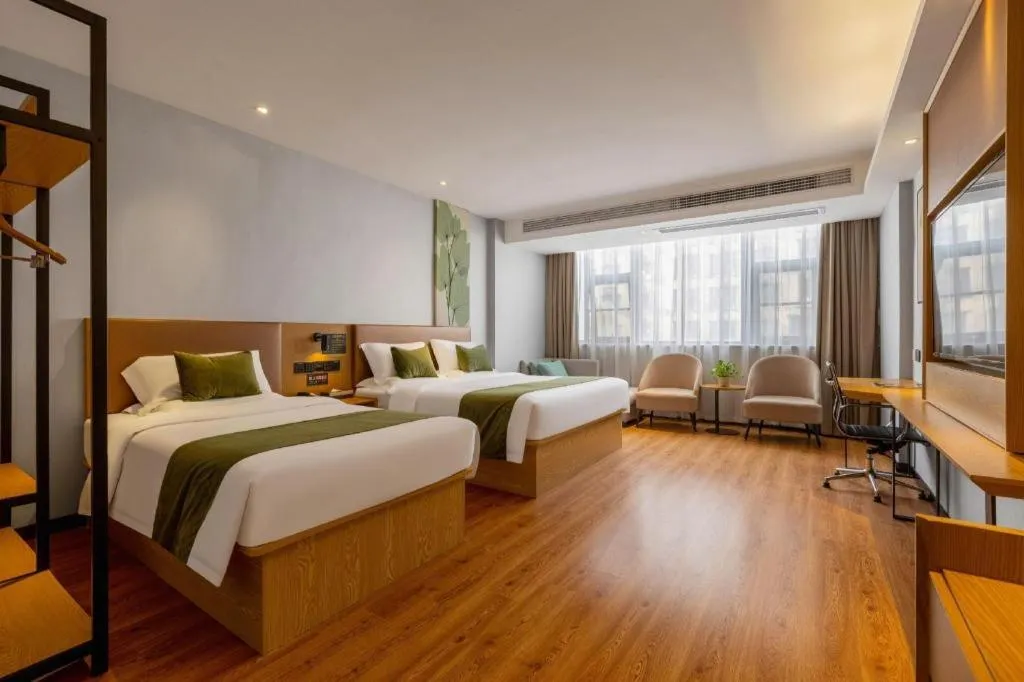 Bed in GreenTree Inn Express Fuzhou Le'an County Government Sijiu Square