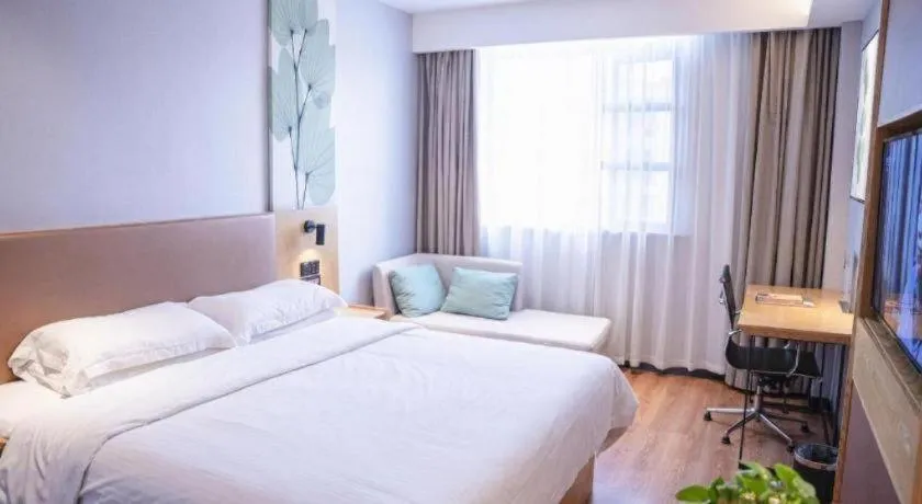 Bed in GreenTree Inn Express Fuzhou Le'an County Government Sijiu Square