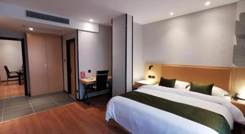 Bed in GreenTree Inn Express Fuzhou Le'an County Government Sijiu Square