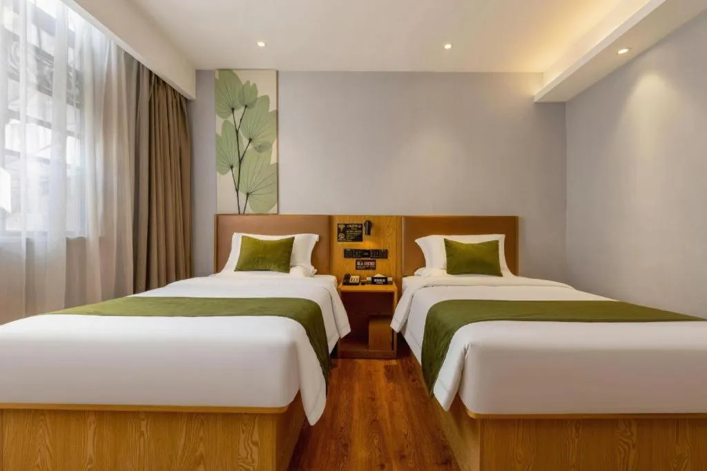 Bed in GreenTree Inn Express Fuzhou Le'an County Government Sijiu Square
