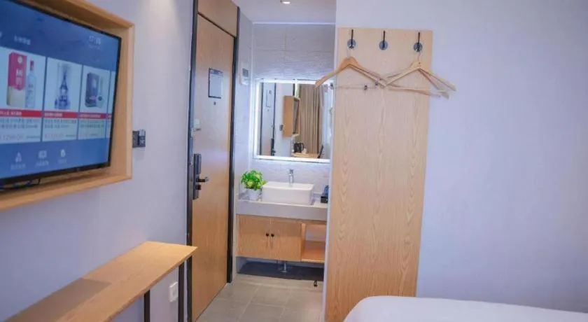 Bed in GreenTree Inn Express Fuzhou Le'an County Government Sijiu Square