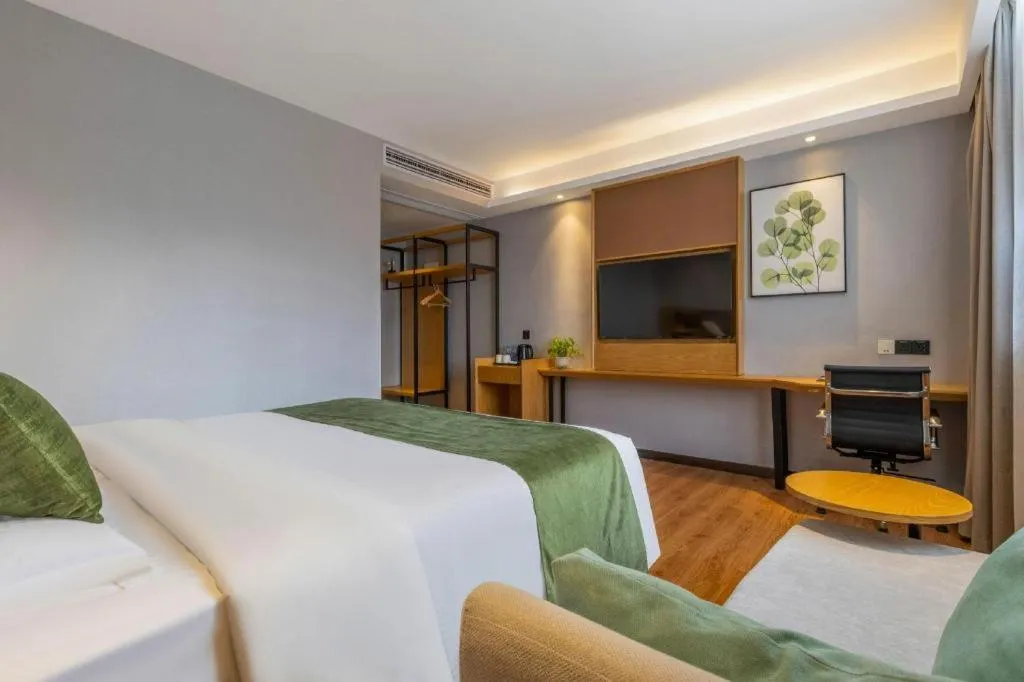 Bed in GreenTree Inn Express Fuzhou Le'an County Government Sijiu Square