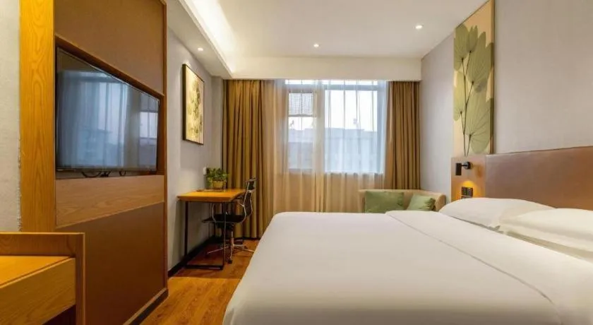 Bed in GreenTree Inn Express Fuzhou Le'an County Government Sijiu Square