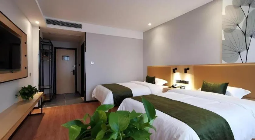 Bed in GreenTree Inn Express Fuzhou Le'an County Government Sijiu Square