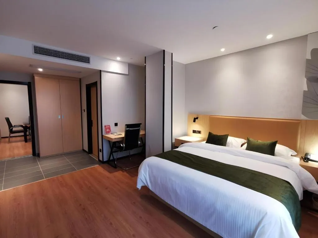 Bed in GreenTree Inn Express Fuzhou Le'an County Government Sijiu Square