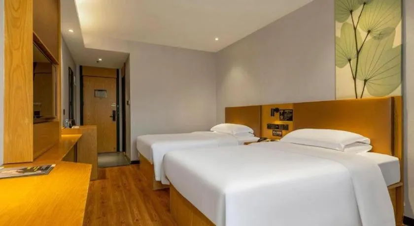 Bed in GreenTree Inn Express Fuzhou Le'an County Government Sijiu Square