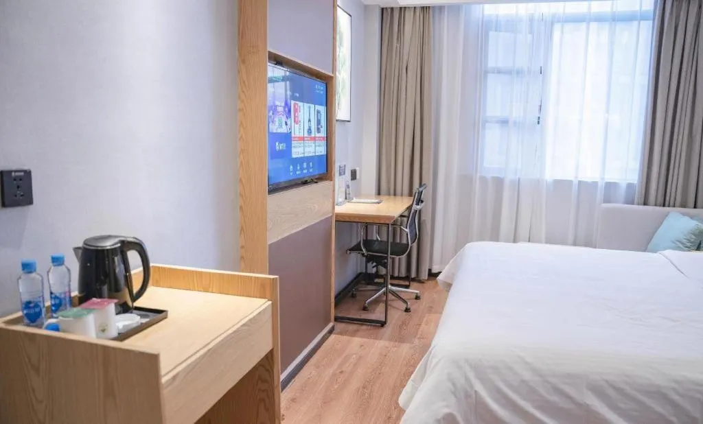 Bed in GreenTree Inn Express Fuzhou Le'an County Government Sijiu Square