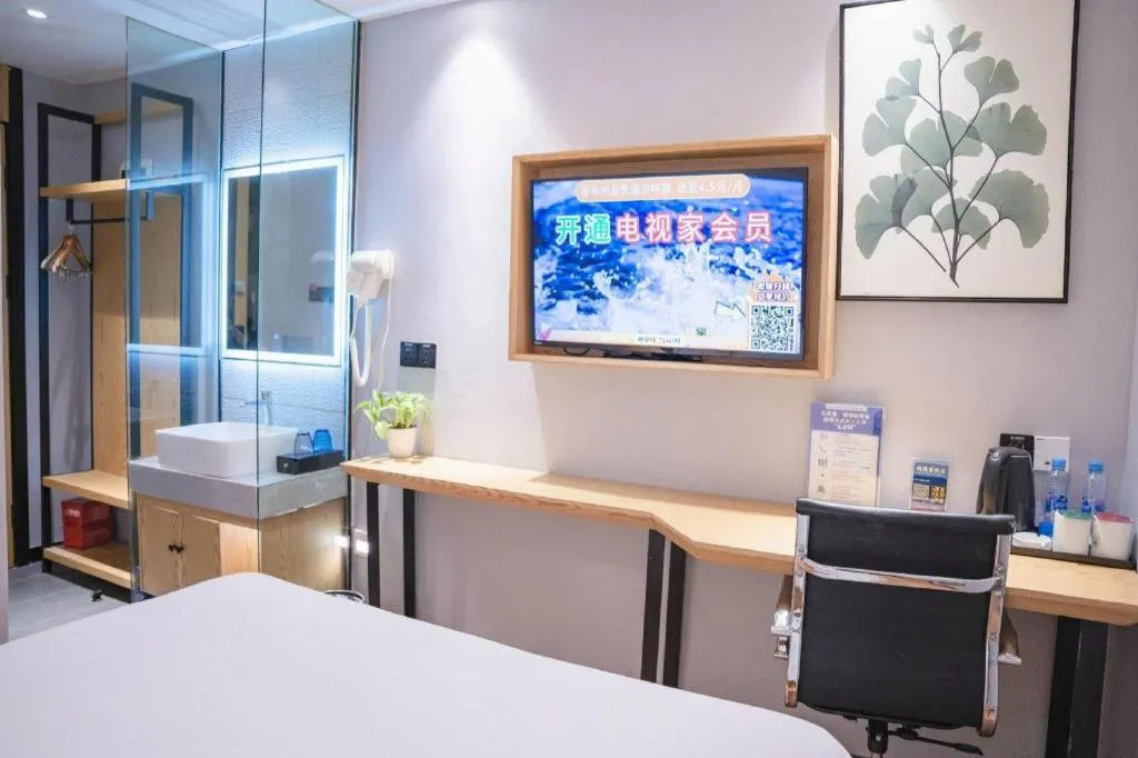 Bed in GreenTree Inn Express Fuzhou Le'an County Government Sijiu Square