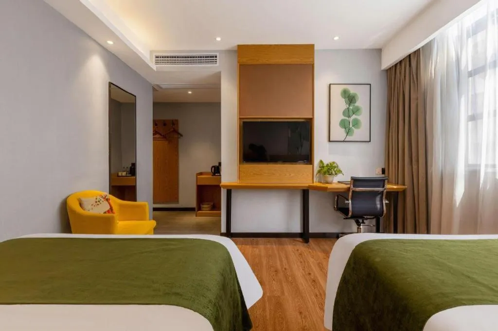 Bed in GreenTree Inn Express Fuzhou Le'an County Government Sijiu Square