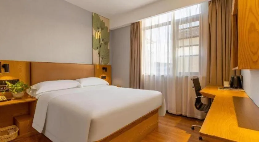 Bed in GreenTree Inn Express Fuzhou Le'an County Government Sijiu Square