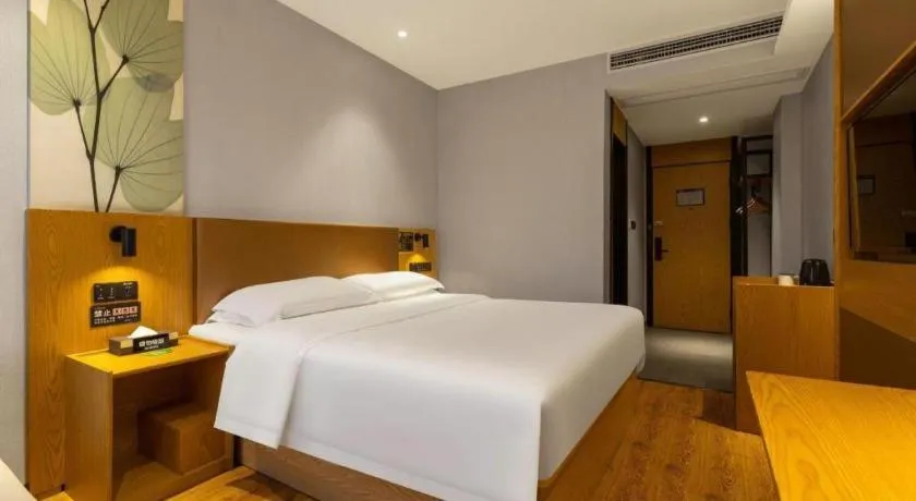 Bed in GreenTree Inn Express Fuzhou Le'an County Government Sijiu Square