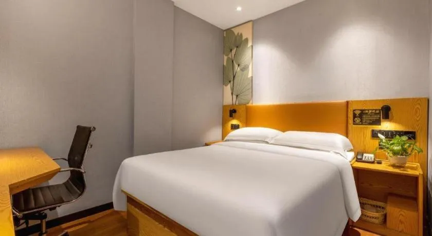 Bed in GreenTree Inn Express Fuzhou Le'an County Government Sijiu Square