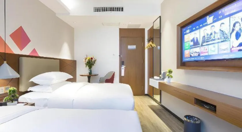 Bed in Borrman Hotel Guangzhou Southern Hospital Meihuayuan Metro Station