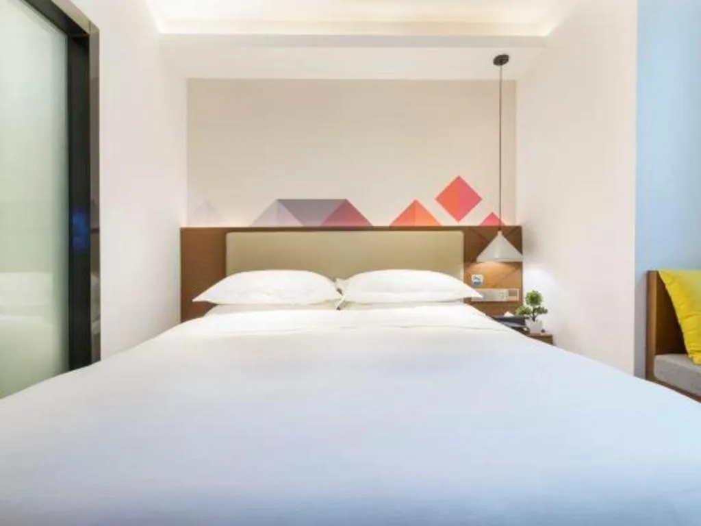 Bed in Borrman Hotel Guangzhou Southern Hospital Meihuayuan Metro Station