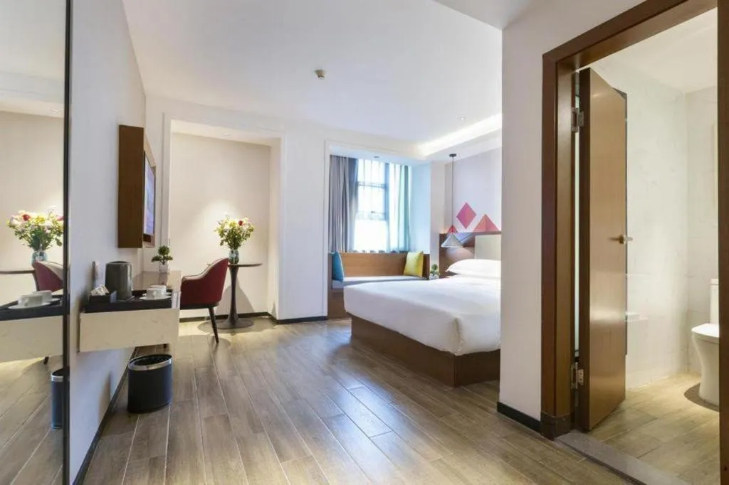 Bed in Borrman Hotel Guangzhou Southern Hospital Meihuayuan Metro Station