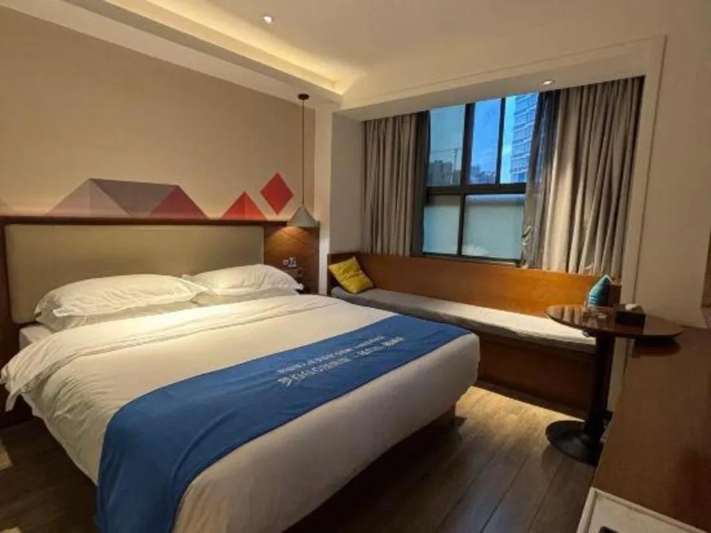 Bed in Borrman Hotel Guangzhou Southern Hospital Meihuayuan Metro Station