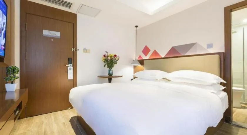 Bed in Borrman Hotel Guangzhou Southern Hospital Meihuayuan Metro Station