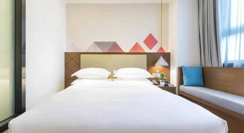 Bed in Borrman Hotel Guangzhou Southern Hospital Meihuayuan Metro Station