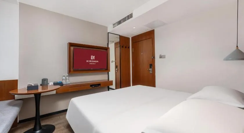 Bed in Borrman Hotel Guangzhou Southern Hospital Meihuayuan Metro Station