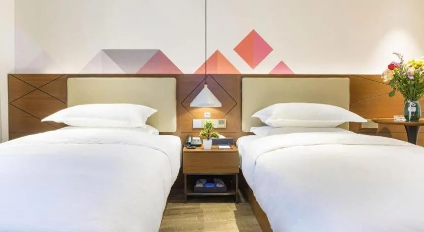 Bed in Borrman Hotel Guangzhou Southern Hospital Meihuayuan Metro Station