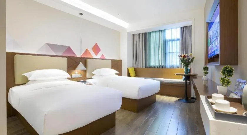 Bed in Borrman Hotel Guangzhou Southern Hospital Meihuayuan Metro Station